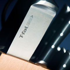 Close-up of T-fal knife set in wooden block.
