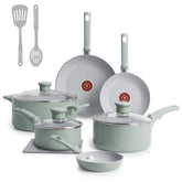 T-fal mint green cookware set including two frying pans, three saucepans with glass lids, one small skillet, two cooking utensils
