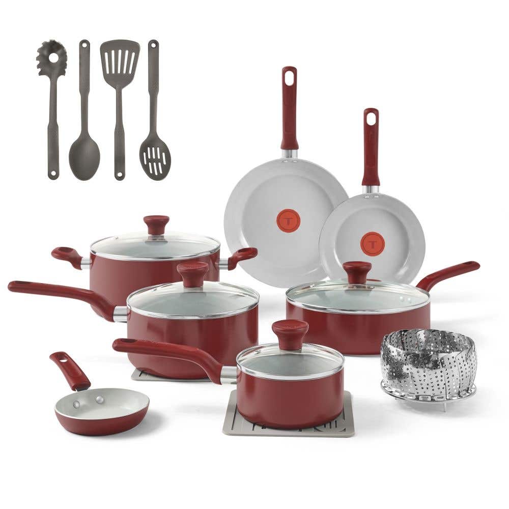 T-fal red cookware set with two frypans, sauté pan, stockpot, saucepan, steamer insert, 4 nyloon tools and 2 silicon trivets