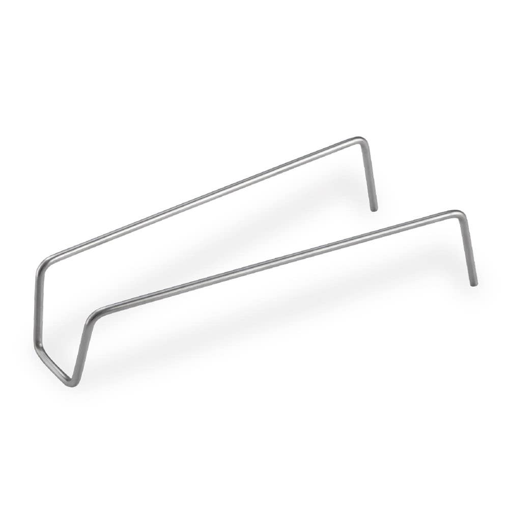 Included accessory: metal stand accessory with two bent legs, used for holding or supporting the steaming basket.