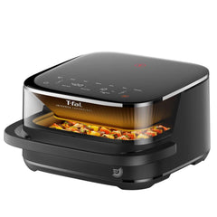 Photo of a black Infared Air fryer with a glass window, interior infrared heat and digital touch controls, food tray with vegetables inside.