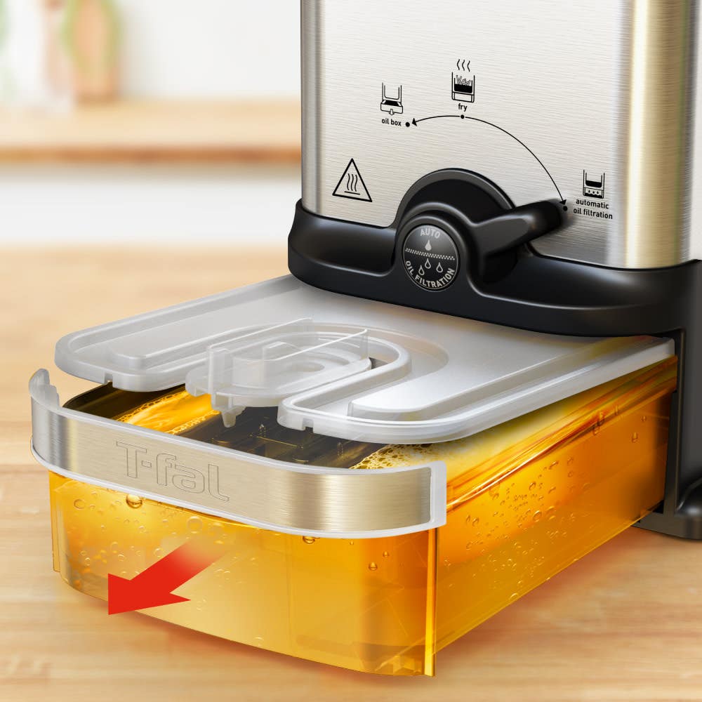 Deep fryer with automatic oil filtration. Lever indicates oil box and fry settings. Transparent container collects filtered oil below.