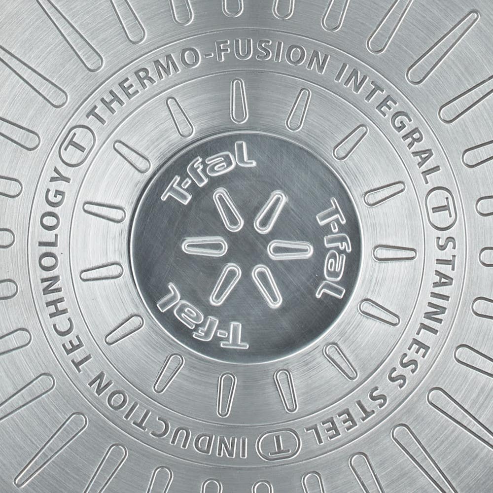 Close-up of the bottom of the T-fal stainless steel Gourmet pan featuring Thermo-Fusion Integral technology, an induction compatible bottom.