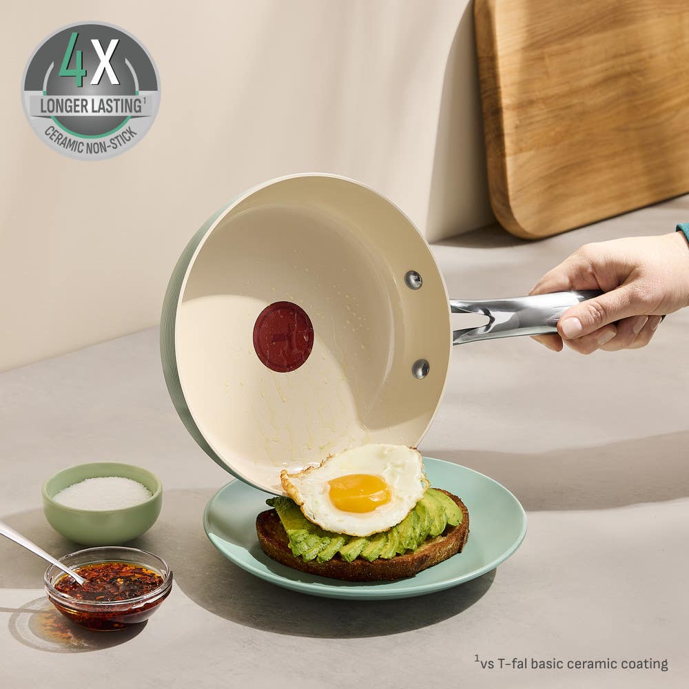 Ceramic pan slides egg onto toast, 4X longer-lasting badge vs T-fal basic coat.